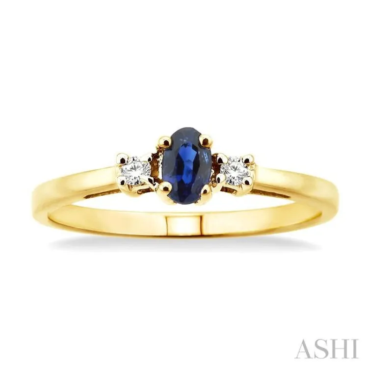 5x3 MM Oval Cut Sapphire and 1/20 Ctw Round Cut Diamond Ring in 10K Yellow Gold