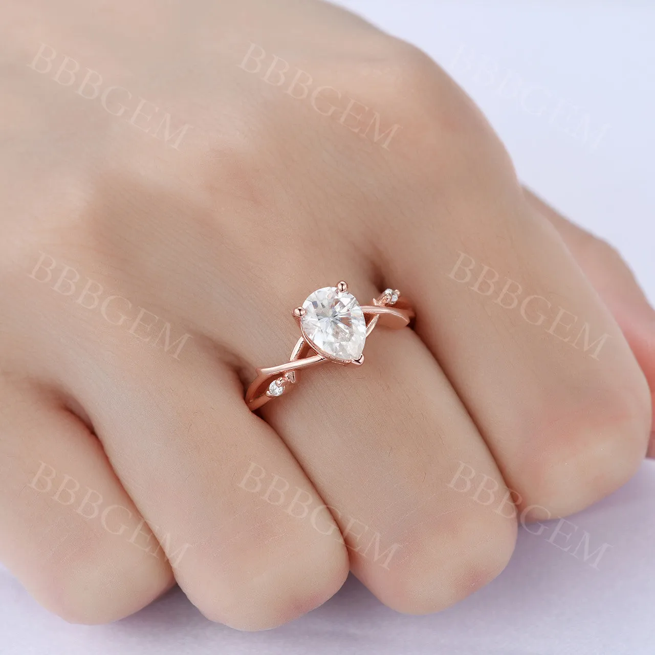 Dainty Pear Cut Moissanite Engagement Ring 1.25CT Rose Gold Twist Band