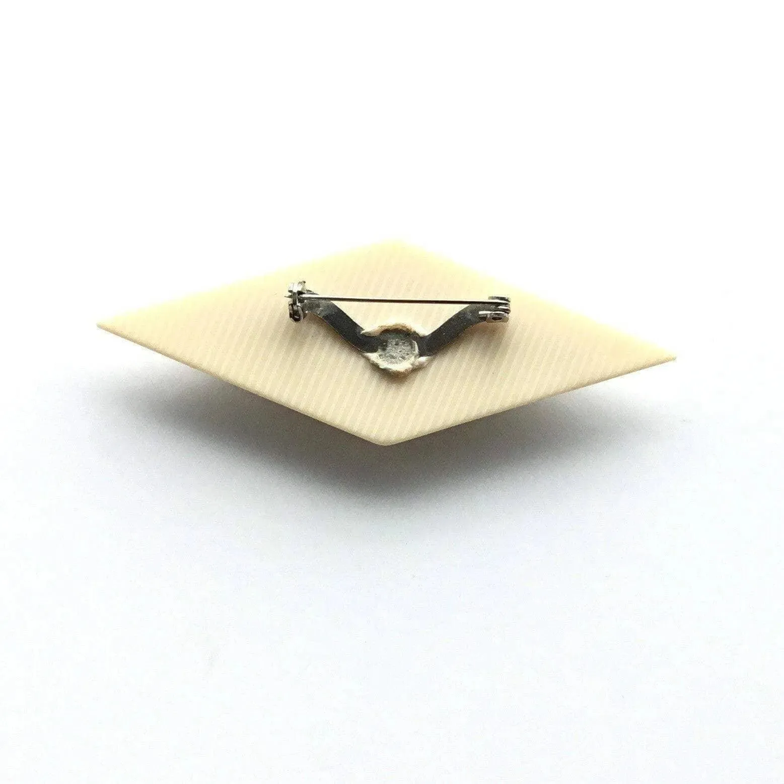 Léa Stein jewelry diamond shaped vintage plastic brooch