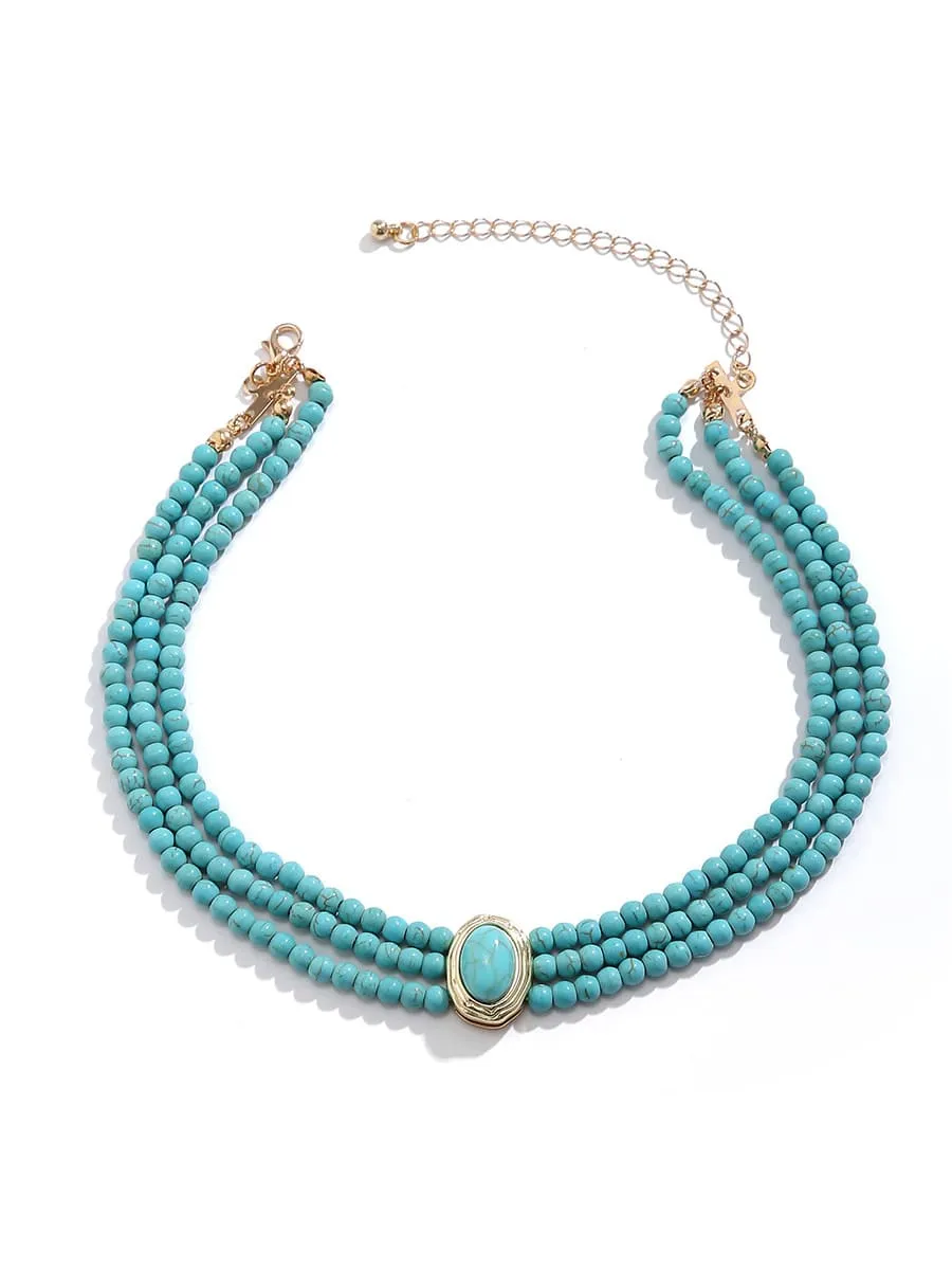 Short faux pearl and turquoise bead necklace